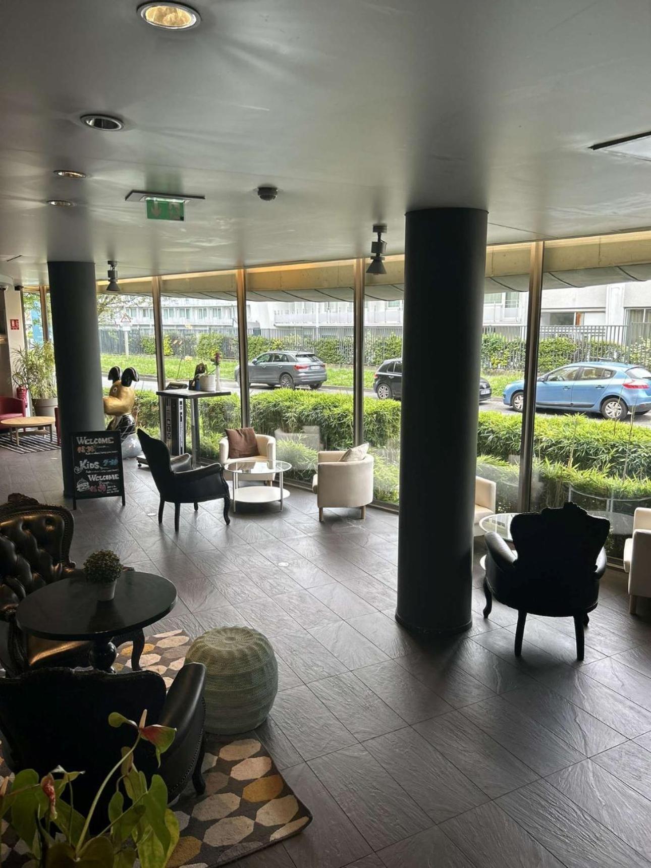 Standing Hotel Suites By Actisource Roissy-en-France Exterior photo